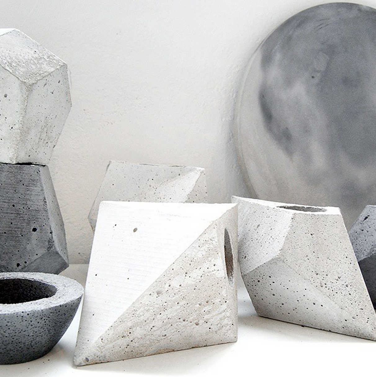 Beautiful geometric concrete vase and other objects from Flint